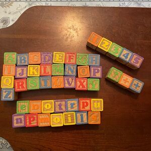 Vintage wooden children’s alphabet, number building blocks.